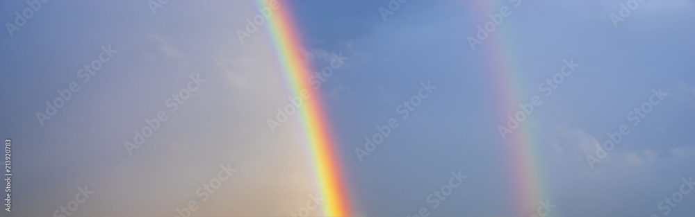 double, beautiful, multi-colored rainbow after passing a spring downpour double, beautiful, multi-colored rainbow after passing a spring downpour