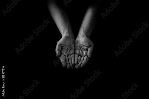 Helping hand concept, Man's hands palms up, giving care and support, reaching out