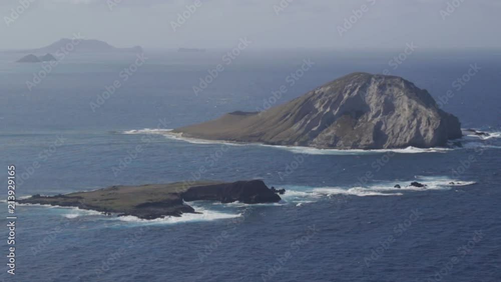 Two Large Islands Surrounded By Blue Ocean Waves in Hawaii Two Large Islands Surrounded By Blue Ocean Waves in Hawaii