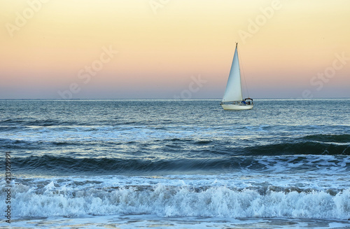 yacht and blue water ocean photo