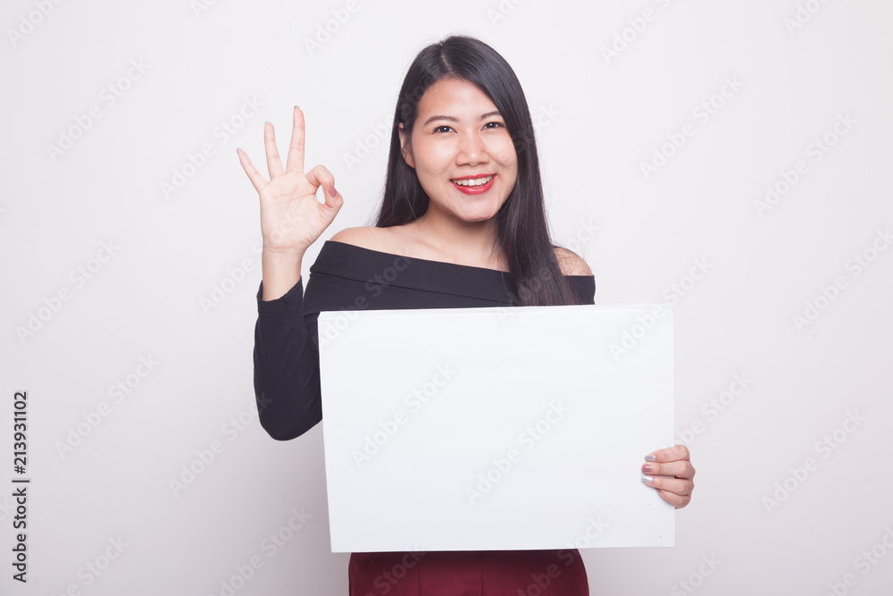 Young Asian woman show OK with white blank sign. Young Asian woman show OK with white blank sign.