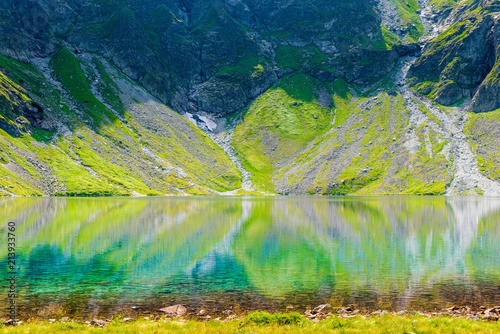 Fototapeta Naklejka Na Ścianę i Meble -  a landmark of Poland in the high Tatras - a picturesque lake Czarny Staw