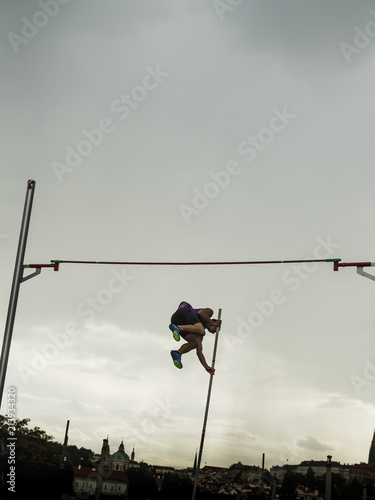 Athlete in action of high jump. Prague. Czech Republic