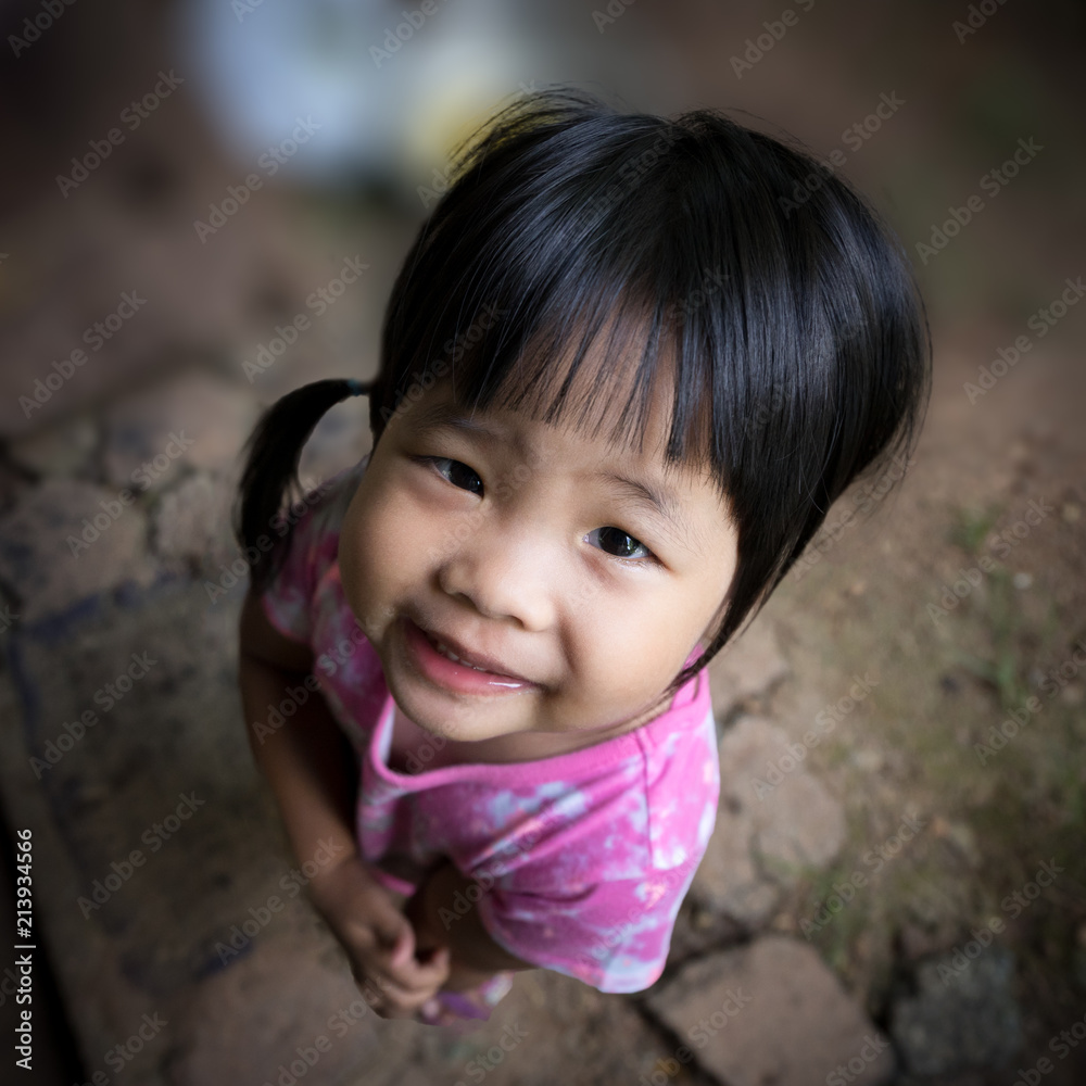 close up face of happy positive smiling little asian girl close up face of happy positive smiling little asian girl