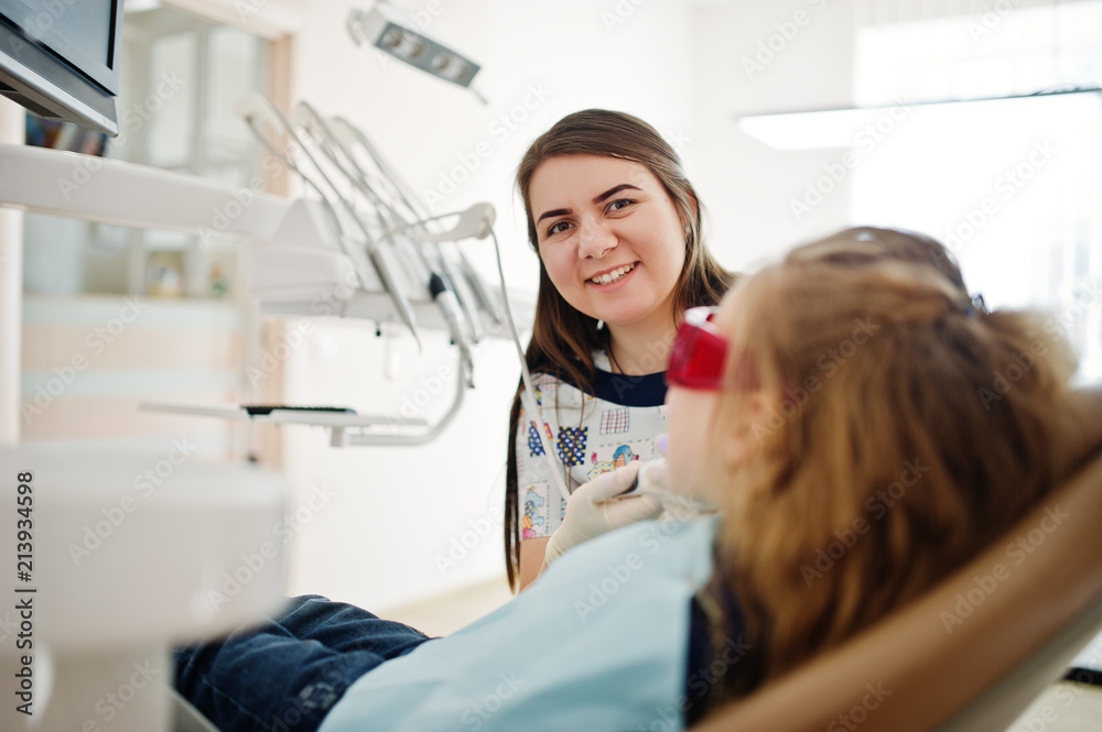 Little baby girl at dentist chair. Children dental. Little baby girl at dentist chair. Children dental.