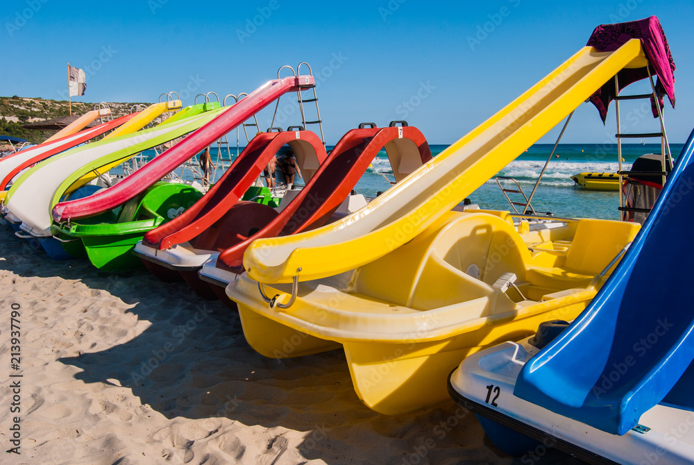 Line of colorful pedalos
