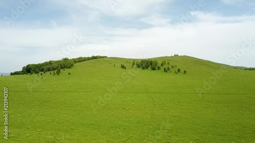 Over a small mountain on the grassland