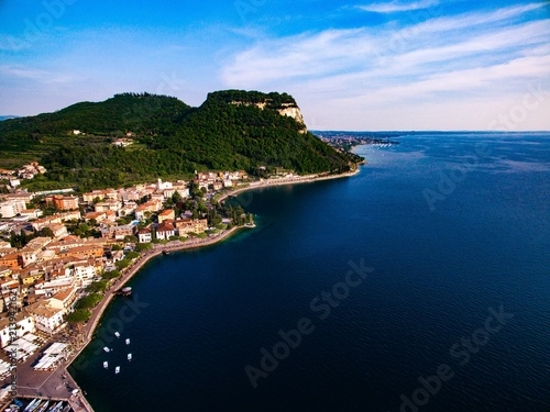 Fototapeta Naklejka Na Ścianę i Meble -  Aerial view of the coast of Lake Garda and a city in Italy.