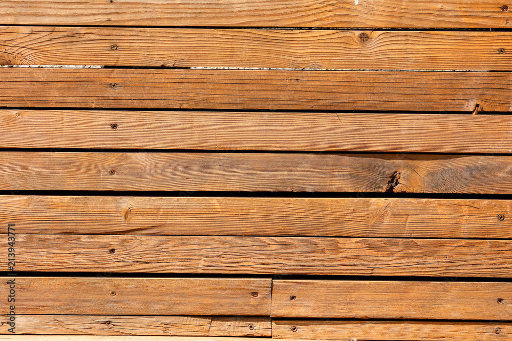 Wooden boards on a fence as an abstract background Wooden boards on a fence as an abstract background