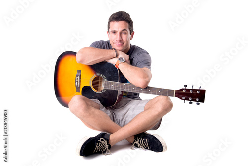 young man playing the guitar