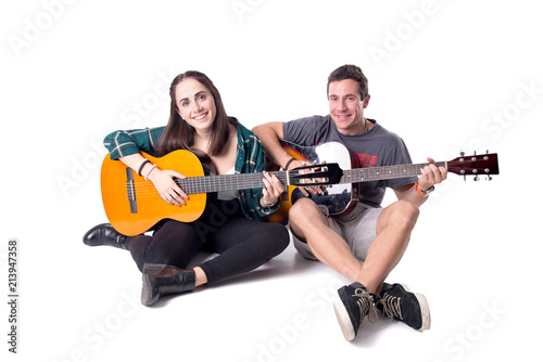 young couple playing the guitar