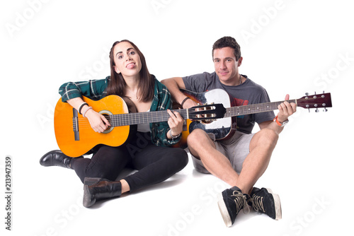 young couple playing the guitar