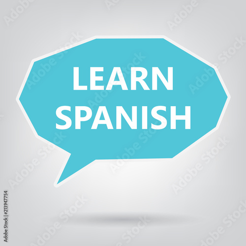 learn spanish written on speech bubble- vector illustration