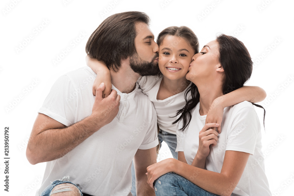 portrait of parents kissing happy daughter isolated on white portrait of parents kissing happy daughter isolated on white