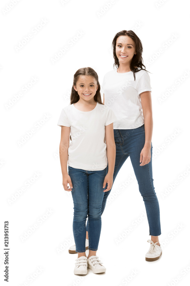 happy mother and daughter in white shirts looking at camera isolated on white happy mother and daughter in white shirts looking at camera isolated on white