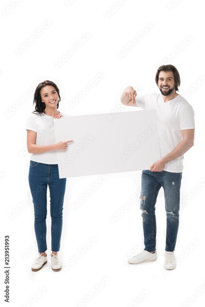 smiling couple pointing at blank banner isolated on white smiling couple pointing at blank banner isolated on white