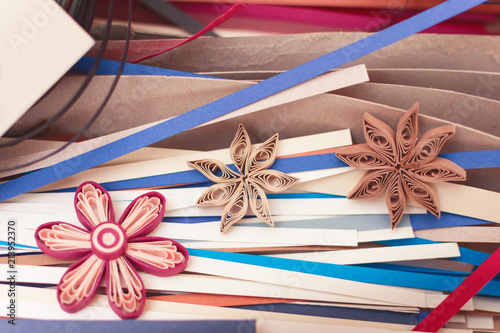 Paper for quilling. Decorative flowers in the quilling technique. Handmade.