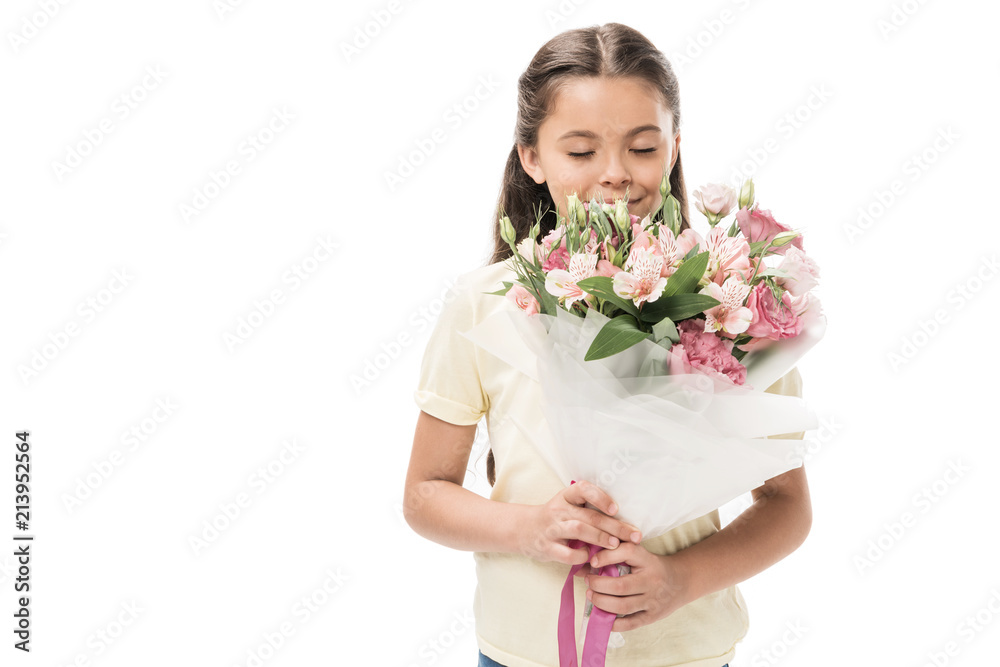 portrait of kid with eyes closed and bouquet of flowers isolated on white