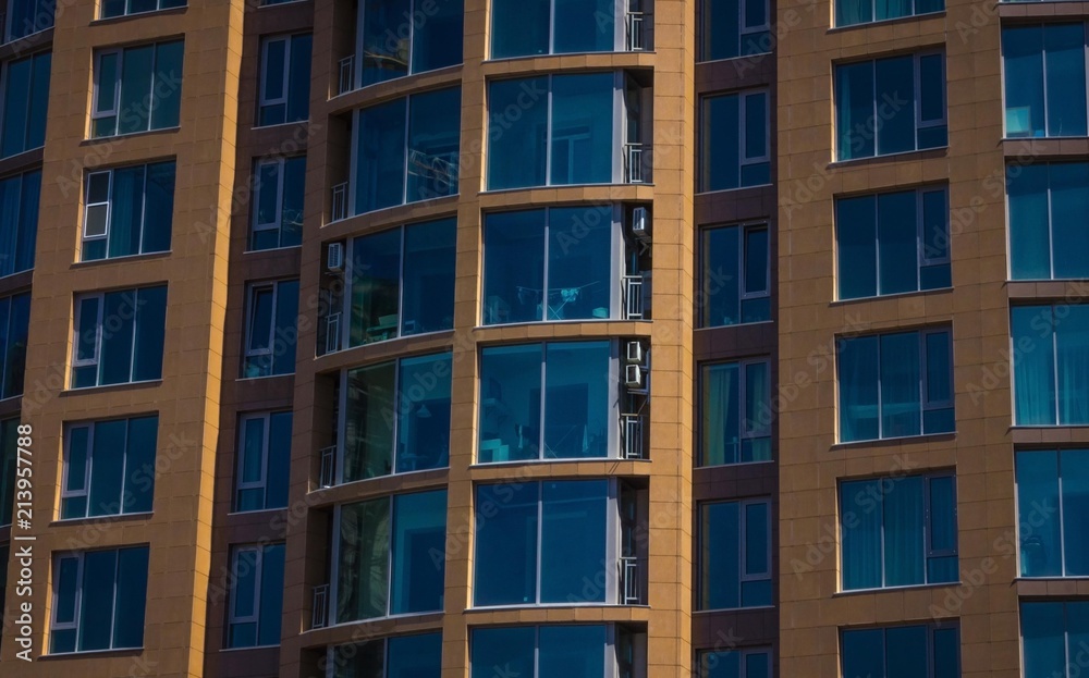Windows of an apartment house. Windows of an apartment house.