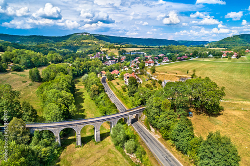 Aerial view of an old railway viaduct in Cleron, a village in France