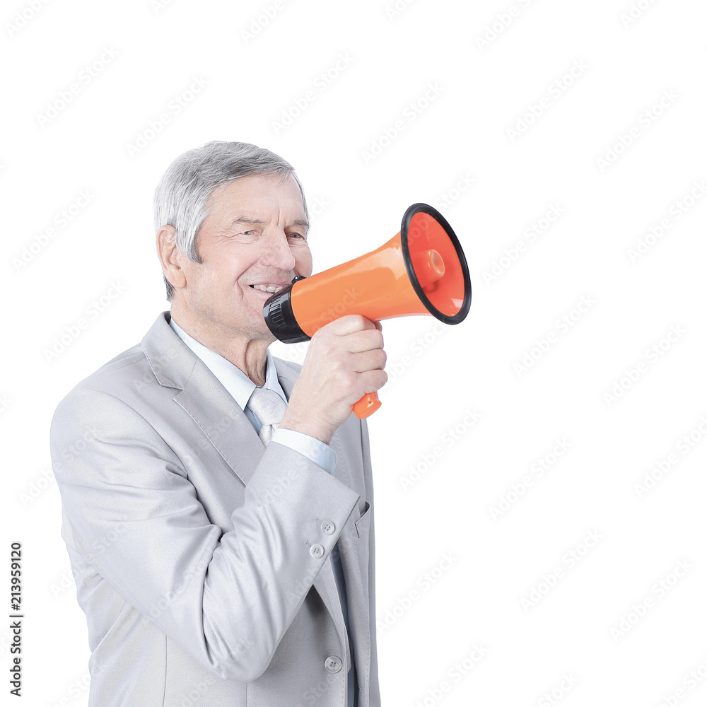 Mature businessman with megaphone.isolated on a white background.