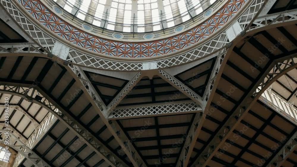 tracking shot on roof with glass dome in the central market of Valencia, Spain