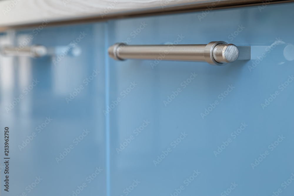 Iron handle on kitchen furniture from varnished materials. Iron handle on kitchen furniture from varnished materials.