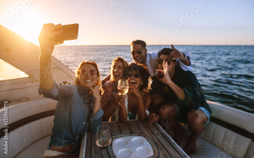 Photography Friends posing for a selfie at boat party