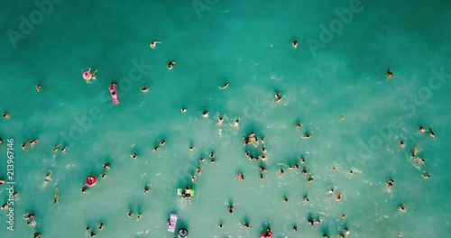 Aerial View From Flying Drone Of People Crowd Having Fun, Playing And Relaxing In Water At The Black Sea In Romania