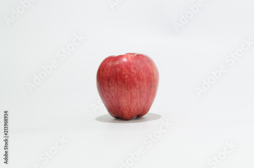 Red apple in white background