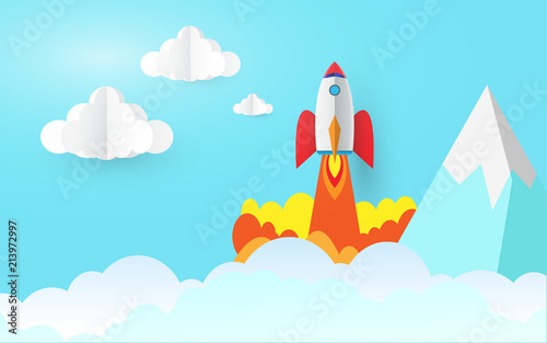 Rocket Launch take off in top sky, Vector illustration paper art of business and start up, Mountain clouds in pastel blue sky of landscape.