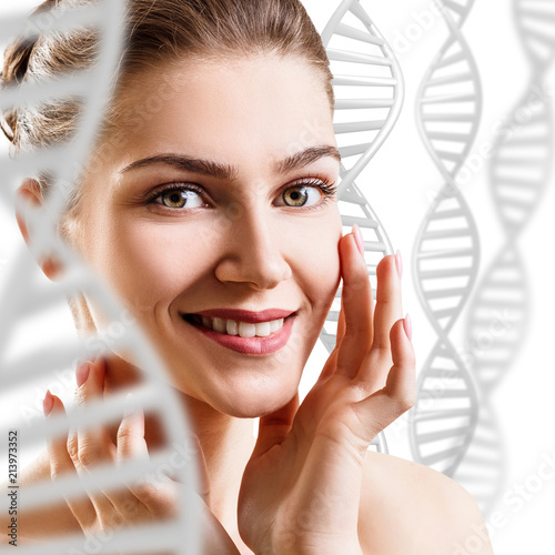 Sensual woman among white DNA chains.