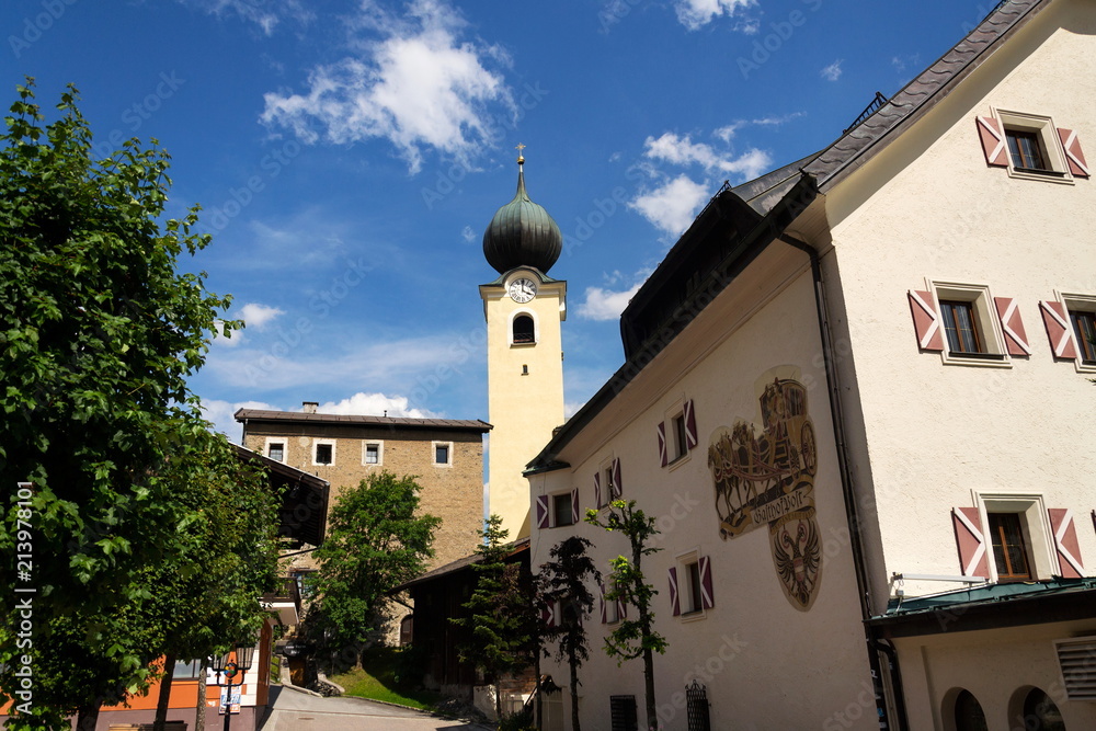 Parish Church of Saint Nicholas and Bartholomew in Saalbach, Austria, sunny summer day