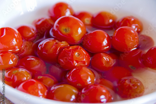 Red tomato in brine