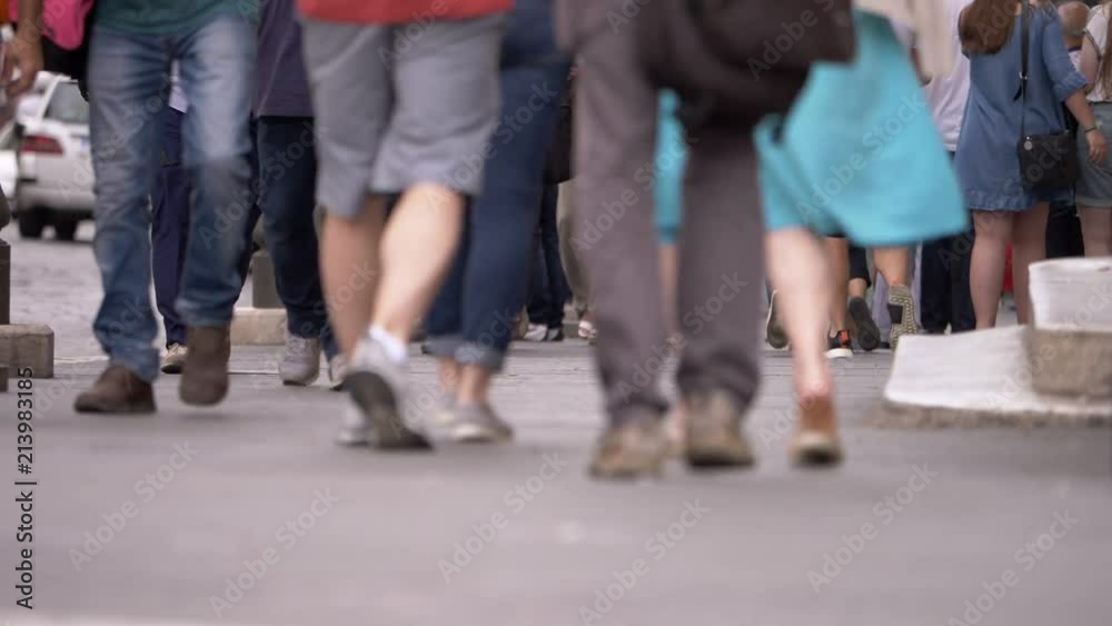 city life, frenzy, people- close up on people legs walking in the city city life, frenzy, people- close up on people legs walking in the city