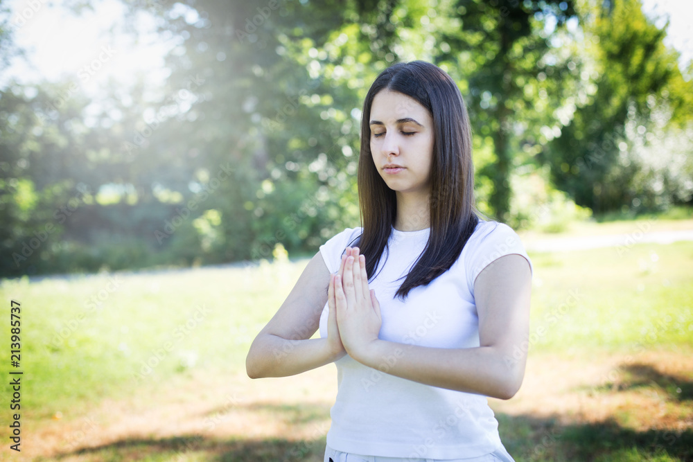 Beautiful girl doing meditation Beautiful girl doing meditation