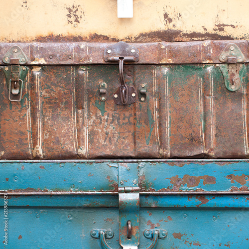 two old shabby suitcases © guppys