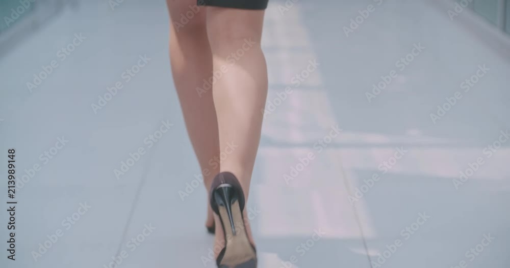 custom made wallpaper toronto digitalfemale legs in high-heeled shoes walking down office hall 4k
