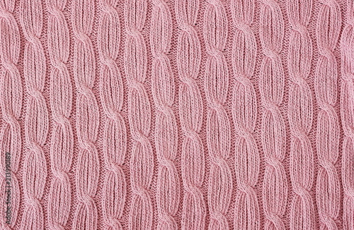 Pale pink knitting wool texture background