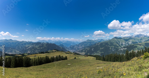 green meadows and great mountain landscape view in Switzerland above Klosters