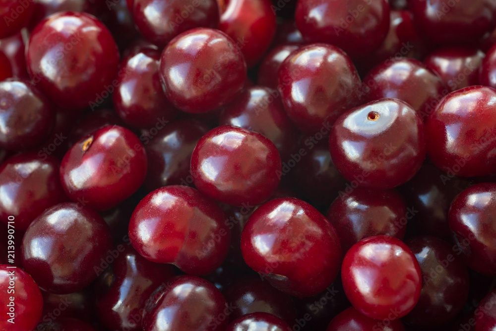 Closeup of ripe cherries. Large collection of fresh red cherries. Ripe cherries background. sweet cherries Closeup of ripe cherries. Large collection of fresh red cherries. Ripe cherries background. sweet cherries