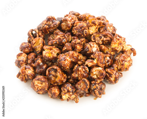 Heap of sweet, tasty popcorn with chocolate isolated on white background