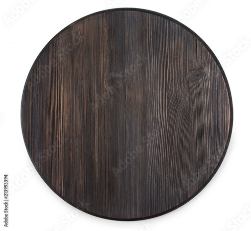 Vintage old textured wooden round cutting board isolated on a white background, top view.