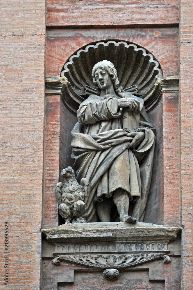 Italy, Bologna Saint John evangelist statue attributed to Giovanni Tedeschi  in the front of Santissimo Salvatore church.