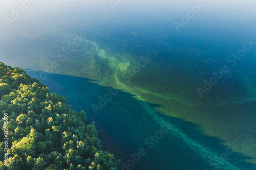 Fototapeta Naklejka Na Ścianę i Meble -  Blue water texture aerial drone view