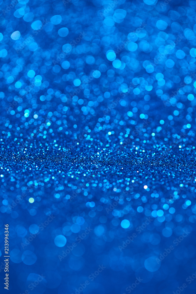 Blue bokeh background of glitter lights Blue bokeh background of glitter lights