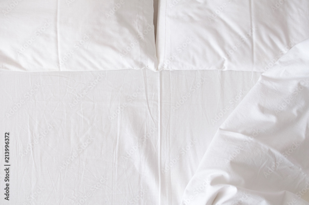 White bedding sheets and pillows White bedding sheets and pillows