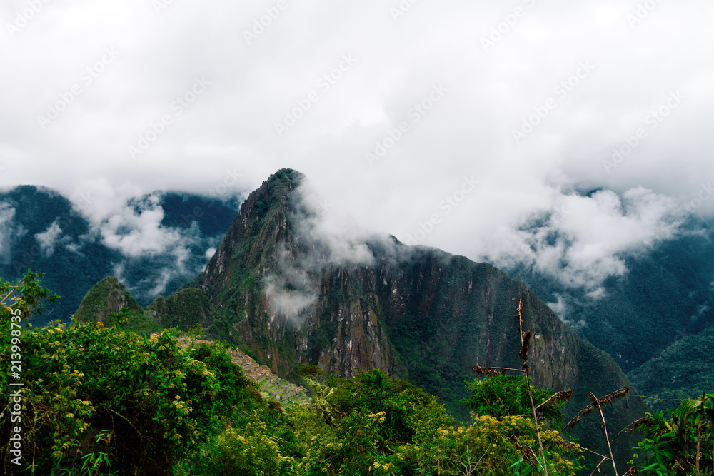 Mountain Huayna Picchu seen from the road to Puerta del Sol (Intipunku) in Machu Picchu Mountain Huayna Picchu seen from the road to Puerta del Sol (Intipunku) in Machu Picchu