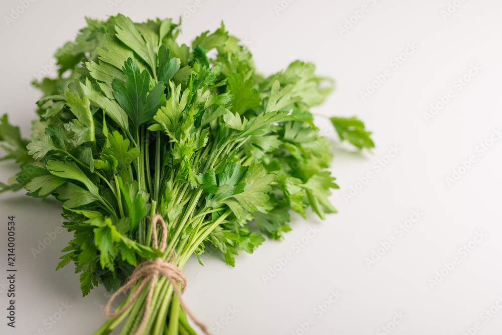 Fresh parsley on white background Fresh parsley on white background