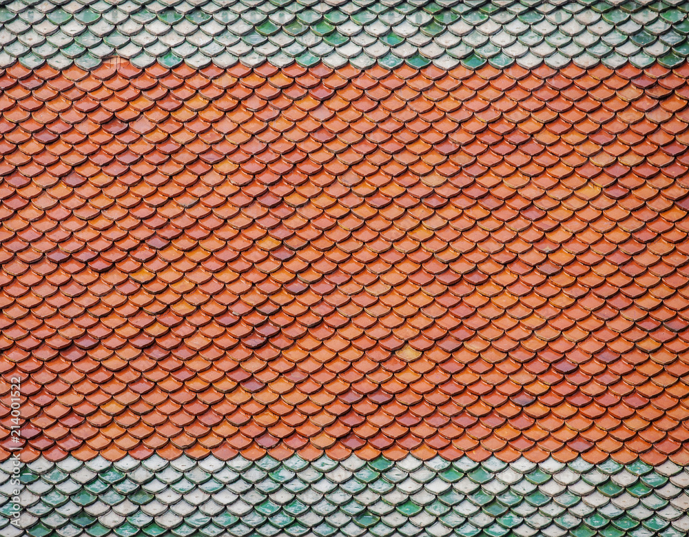 Fototapeta premium Brick roof tiles on roof of a country house of Thailand